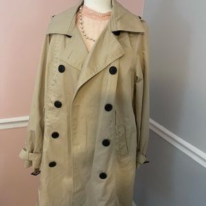 Cream colored trench coat